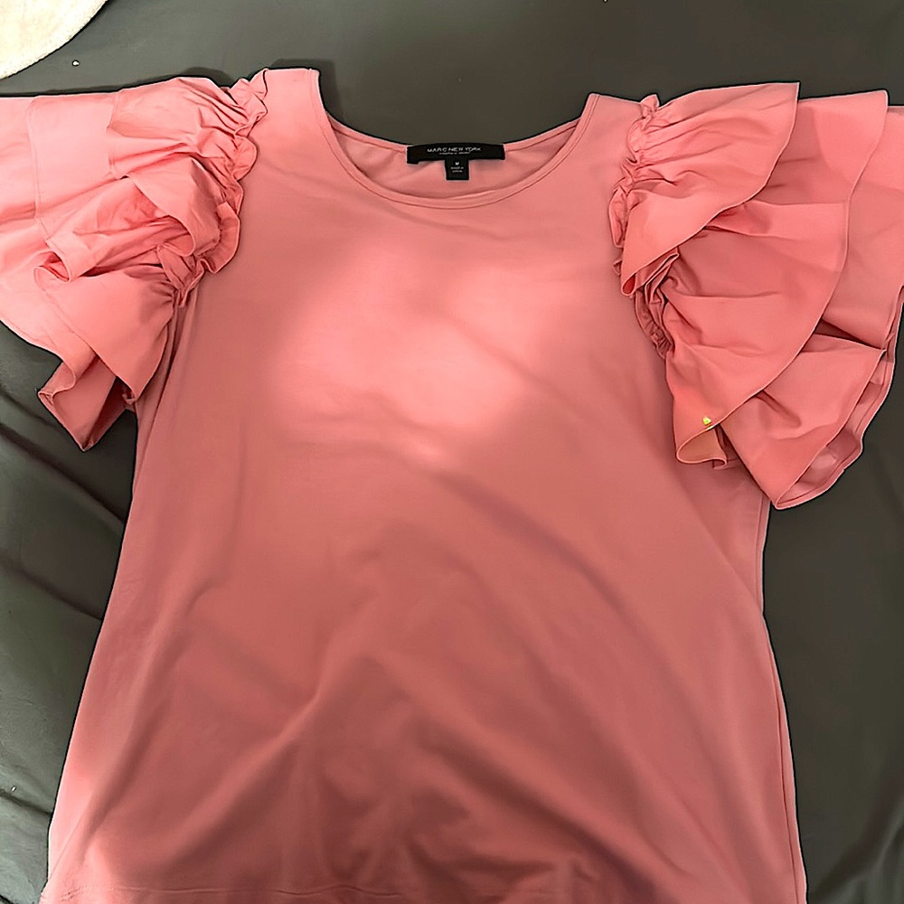 pink ruffled sleeve shirt
